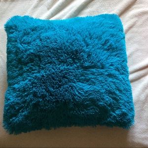 Blue fuzzy pillow